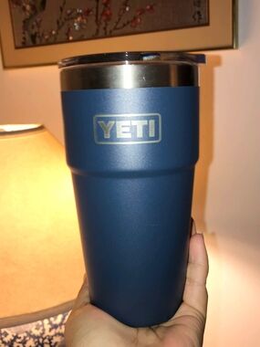 Navy blue YETI Rambler 16 oz Stackable Tumbler customized w/ the Envestnet logo